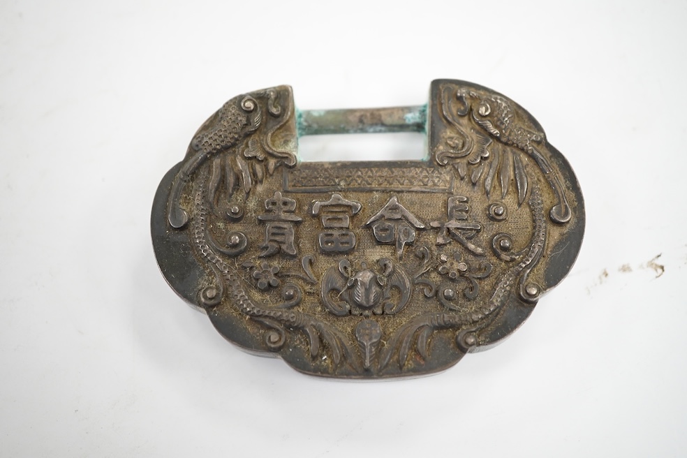 A Chinese white metal leaf dish, 16.4cm, two other Chinese items including a spirit lock and a Japanese white metal frame by Murai Shokai. Condition - poor to fair.